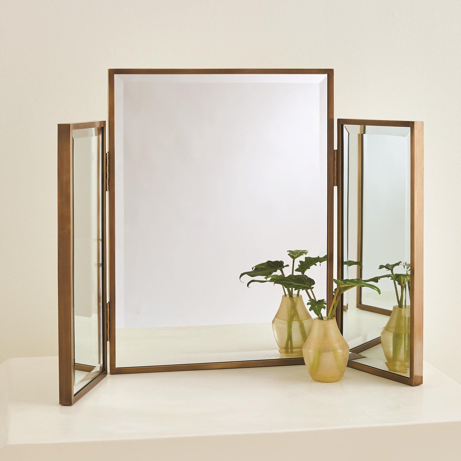 Global Views Echos Vanity Mirror Antique Brass – room setting