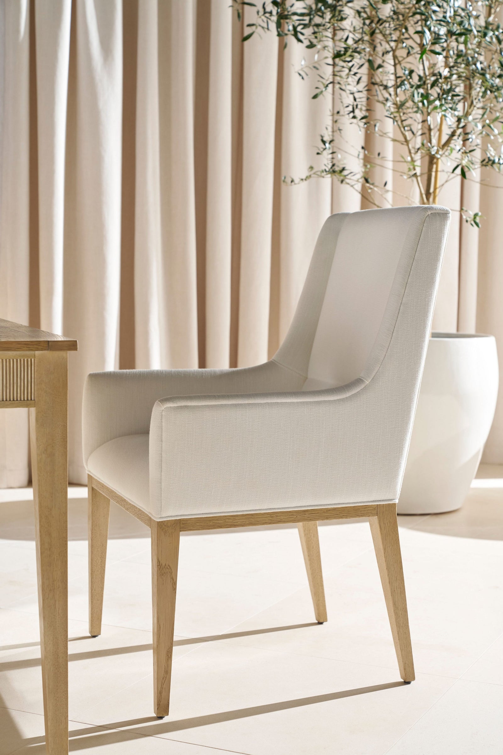 Theodore Alexander Balboa Upholstered Dining Armchair – room setting